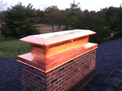 Before and after chimney cap replacement in Franklin Square, NY