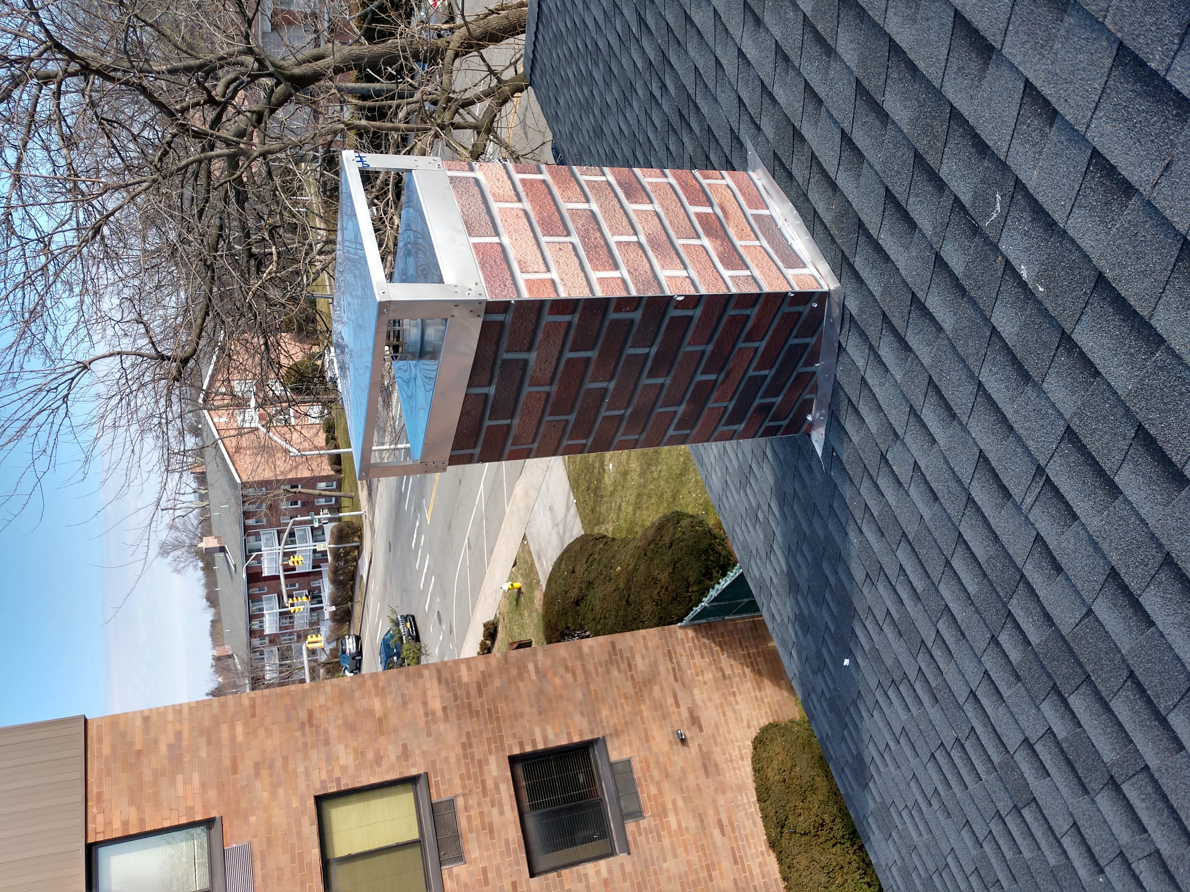 New elastomeric sealant applied to chimney crown in Franklin Square, NY