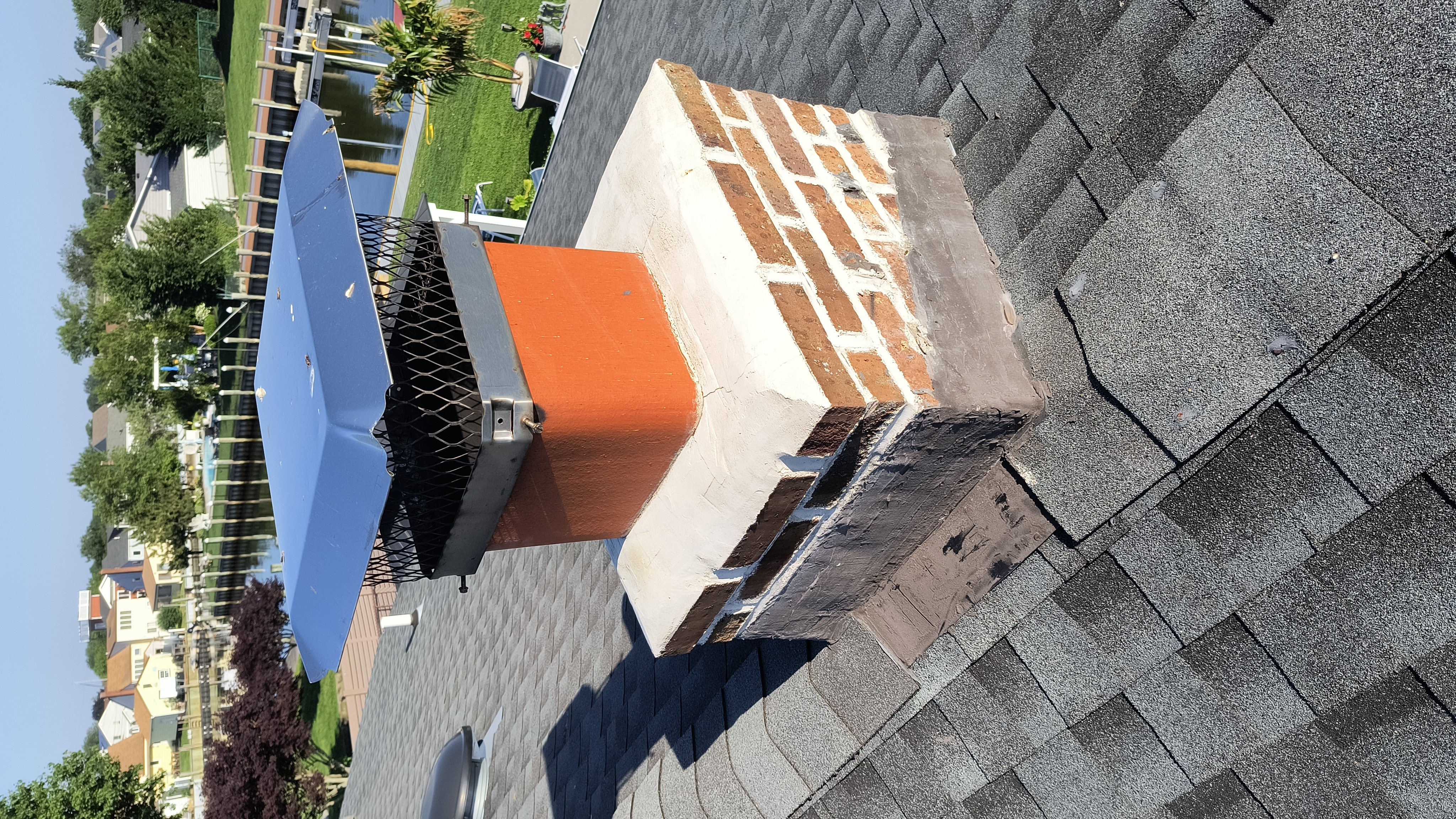 Full chimney masonry rebuild and restoration in Franklin Square, NY