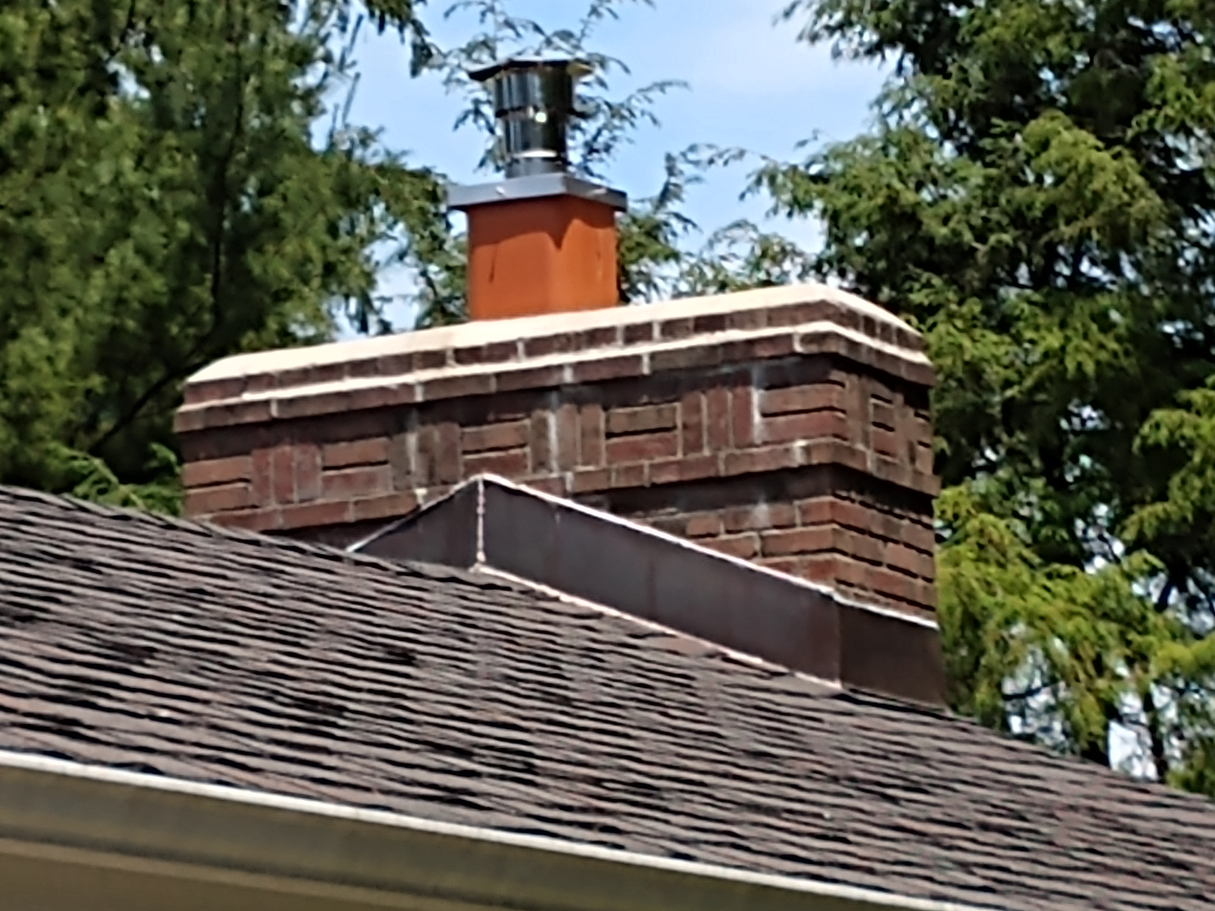 Stainless steel chimney cap with animal guard in Franklin Square, New York